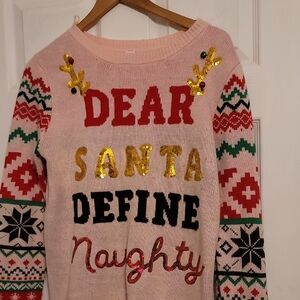 Festive Pink Holiday Sweater with Fun Design